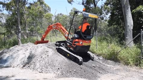 operating mini excavator on slope|installing fan on mini excavator.